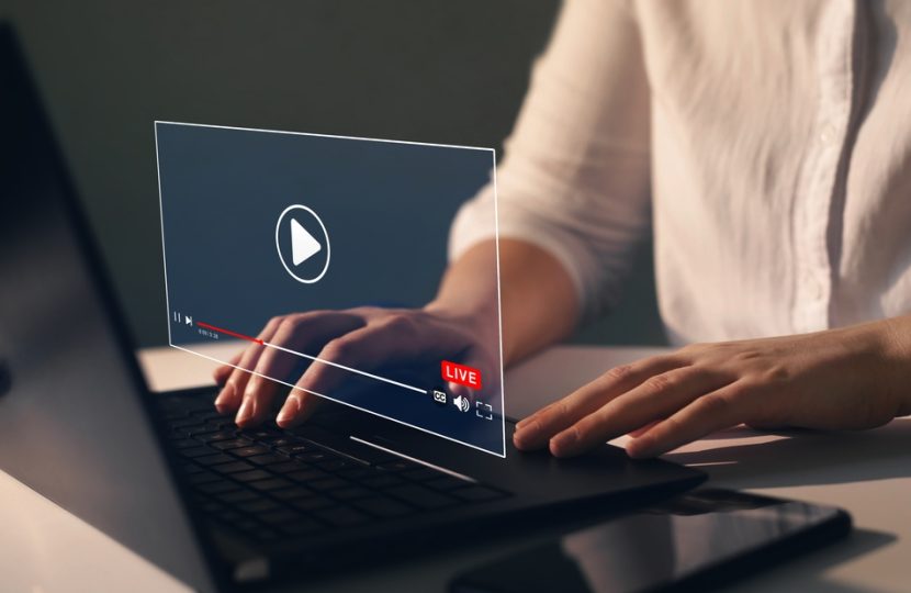 Businesswoman,Watching,A,Live,Stream.online,Live,Stream,Window.,Video,Streaming